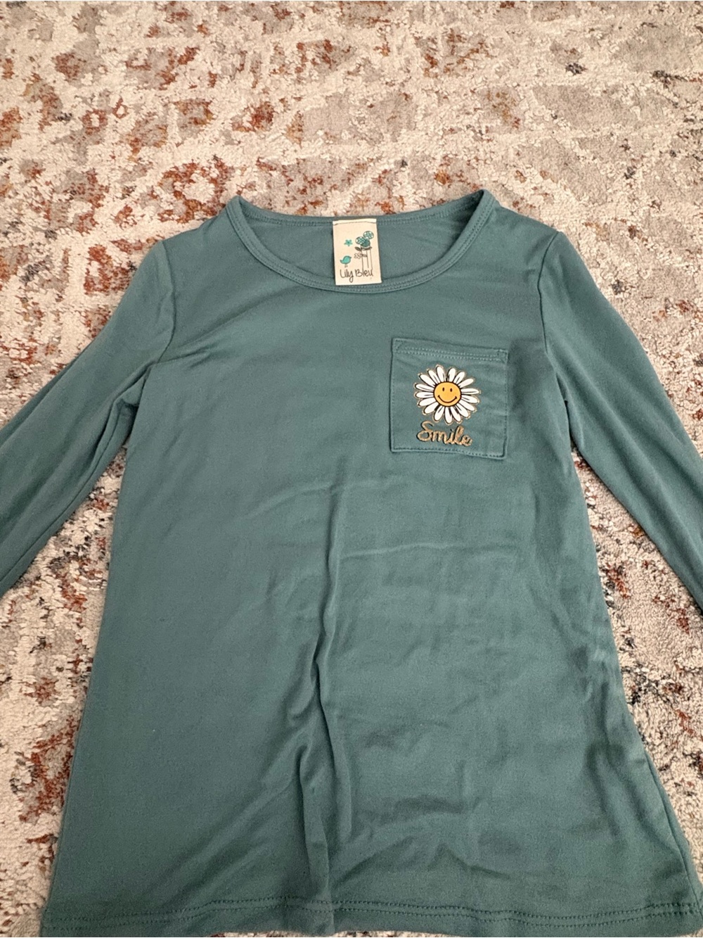 Lily Bleu Teal Long Sleeve Tee with Smiling Daisy Pocket